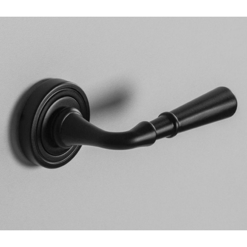 Black round plate door handle.
